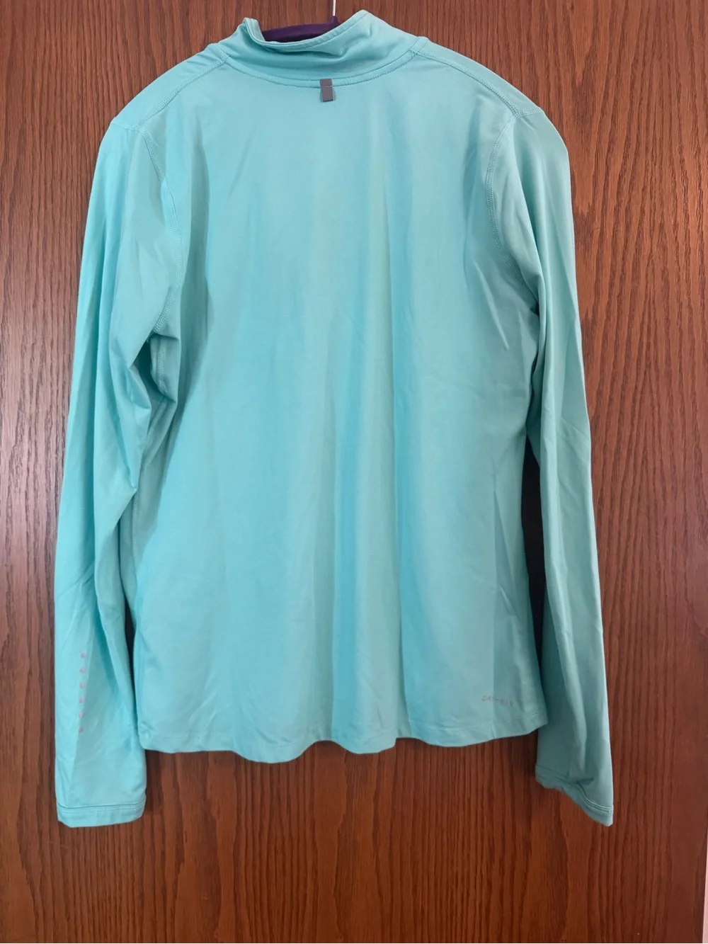 Nike women’s basketball Light Teal Dri-FIT Quarter-Zip Pullover